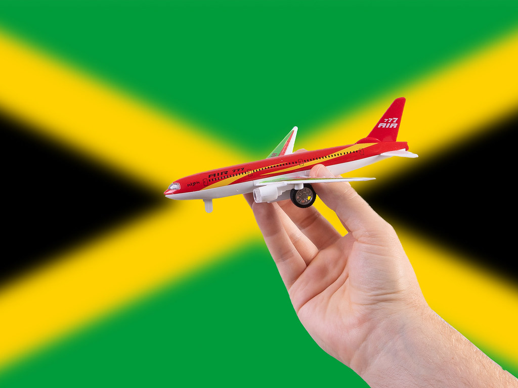drapeau de la Jamaïque avec un avion